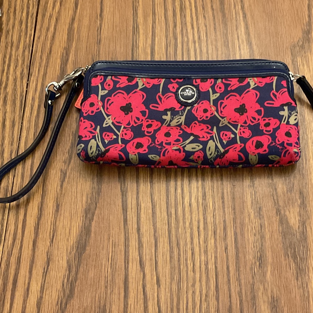 Coach Navy Wristlet with Red Floral Design